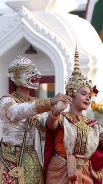 Traditional Thai Khon Dancers Performing in Ornate Costumes at Historic Temple