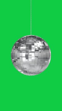 disco ball rotating isolated on green screen loop animation,chroma key 3d music party night and concert vertical social media motion design element