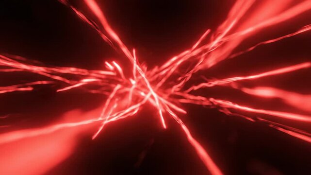 Red light streaks radiate outward in dynamic motion, creating an energetic visual effect against a dark background, emphasizing movement and intensity in a captivating display