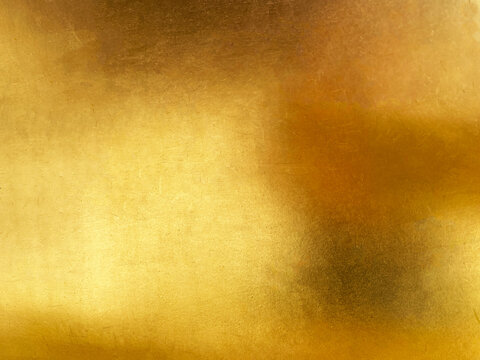 Gold metal background or texture  and gradients shadow horizontal shape, copy space (High resolution), real photo