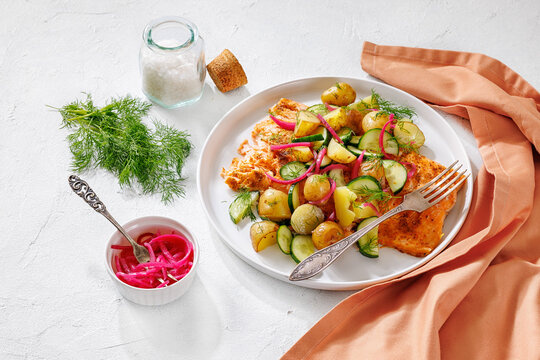 Baked salmon fillet, new potatoes, pickled onion