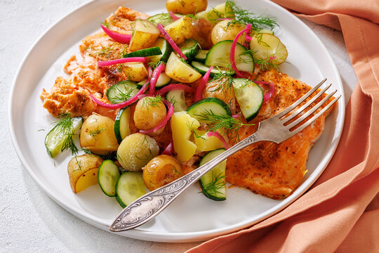 Baked salmon fillet, new potatoes, pickled onion