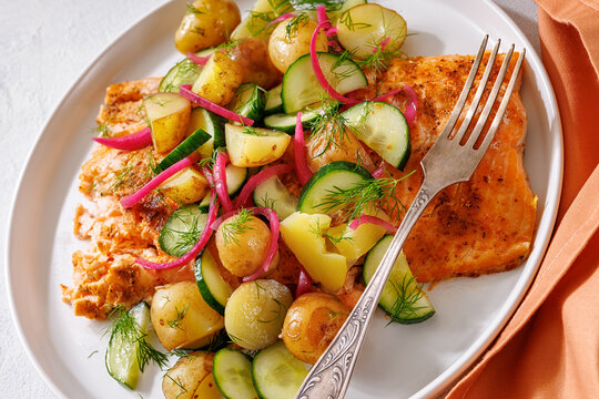 Baked salmon fillet, new potatoes, pickled onion