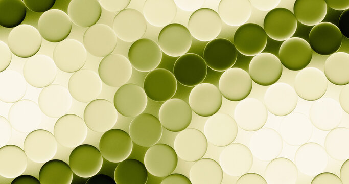 Green glass circles form a dense abstract polka dot pattern