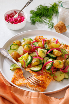 Baked salmon fillet, new potatoes, pickled onion