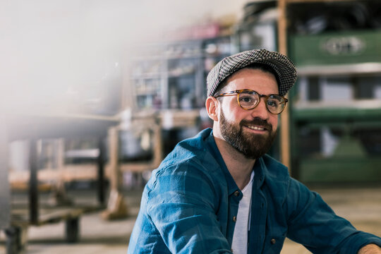 Portrait of smiling man in workshop