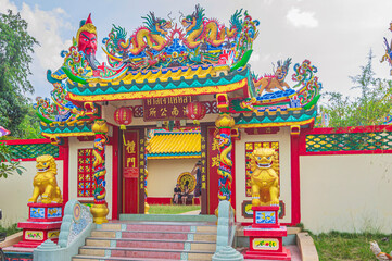 Obraz premium A traditional brightly coloured Chinese temple, located just off the main road in Nathon, Ko Samui, Thailand