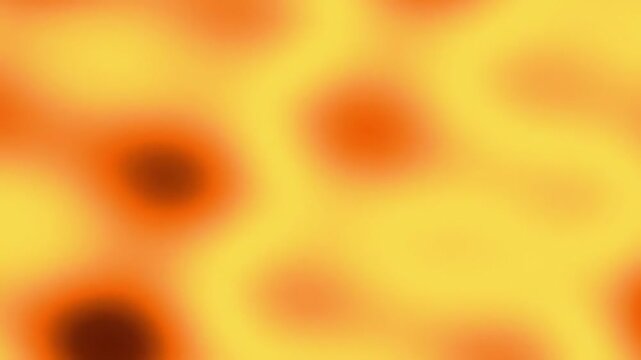Abstract blurred background with warm yellow and orange gradient colors.
