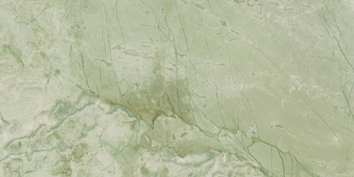 Elegant green marble texture with soft natural veins and warm earthy tones, perfect for luxury interiors, ceramic tiles, and decorative backgrounds.