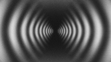 Monochrome grainy concentric circles abstract background for hypnotic sound wave concept © Arthapicture