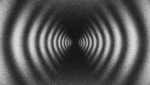Monochrome grainy concentric circles abstract background for hypnotic sound wave concept