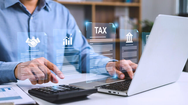 Professional accountant managing electronic tax filing and digital financial documentation on modern office laptop