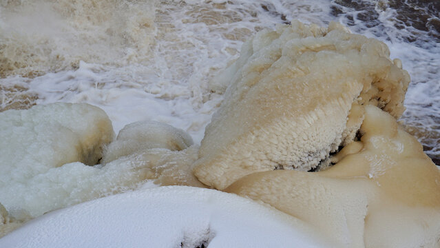 Natural Ice and Snow Formations at River Rapids