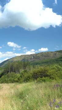 mountain landscape with blue sky and clouds