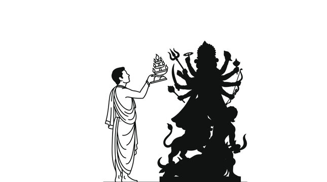 A devotee performing a traditional ritual offering to the goddess Durga.