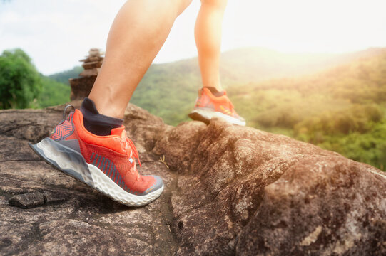 Trail Running Shoes On Rocky Mountain Path Outdoor Fitness Adventure