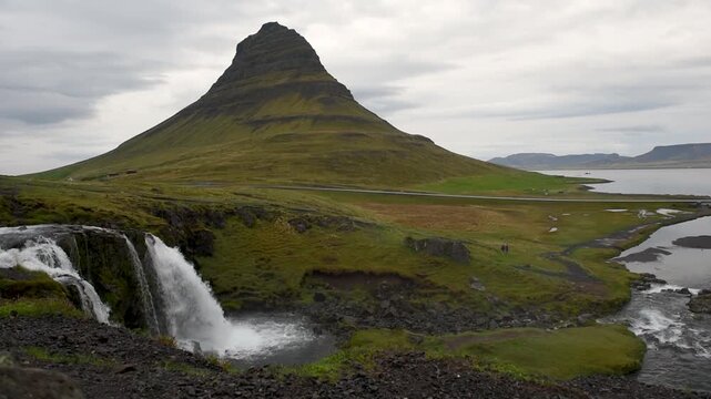   Kirkjufell mountain and Kirkjufellsfoss waterfall in Iceland 
