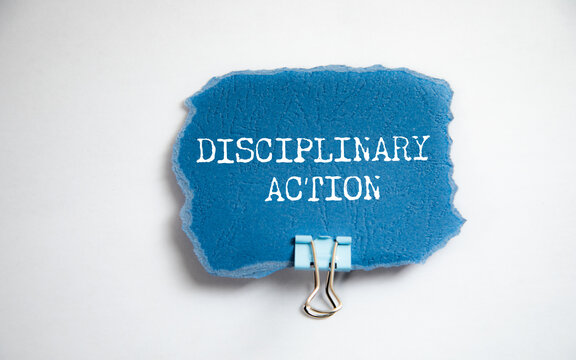 Disciplinary Action Folder on Desk