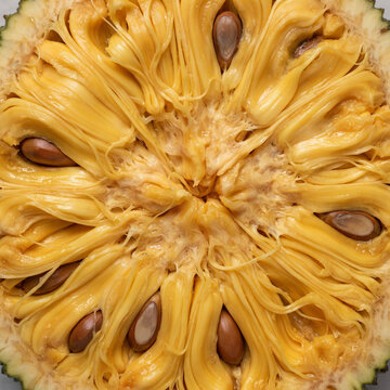 Close up background texture of fresh ripe jackfruit pulps and seeds