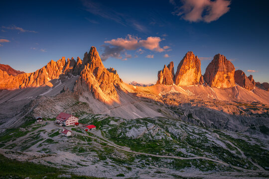 Three Peaks of Lavaredo, Dolomites, Italy. Amazing panorama of Italian  Dolomites with famous Three Peaks of Lavaredo (Tre Cime di Lavaredo) South Tyrol, Italy, Europe at summer sunset.