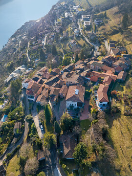 Aerial image of the old town on the top of hill in Morcote. Morcote was credited as one of the most beautiful Swiss villages.
