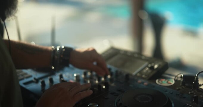 Dj mixing music at pool villa private party during summer event - Entertainment and holidays concept