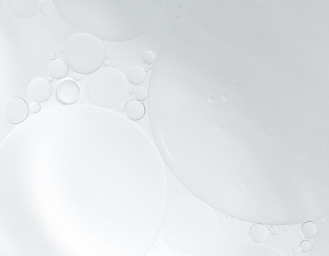 Abstract clear water bubbles essential oil beauty collagen Serum Repair cell background.