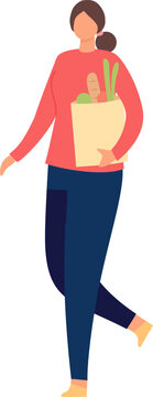 Young woman carrying fresh produce in a paper bag after buying food