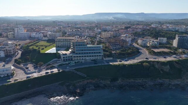 Smy Carlos V Wellness And Spa Alghero Hotel Overlooking The Mediterranean Sea In Alghero, Sardinia, Italy. - aerial shot