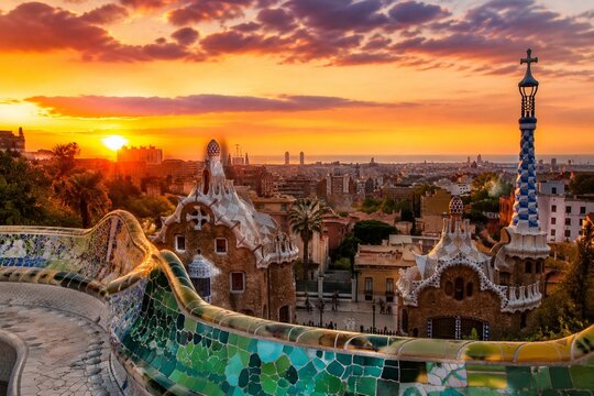 Barcelona park panorama at sunset with mosaic benches and city skyline