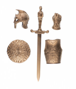 Golden ancient armor, sword and shield isolated on white background