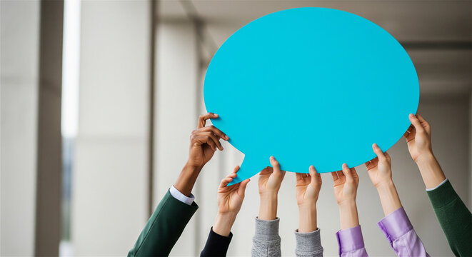 Large blue speech bubble held by diverse hands, conceptual communication and teamwork symbol, collective voice and social media engagement