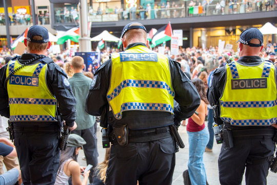 Police Force Patrolling During a Protest