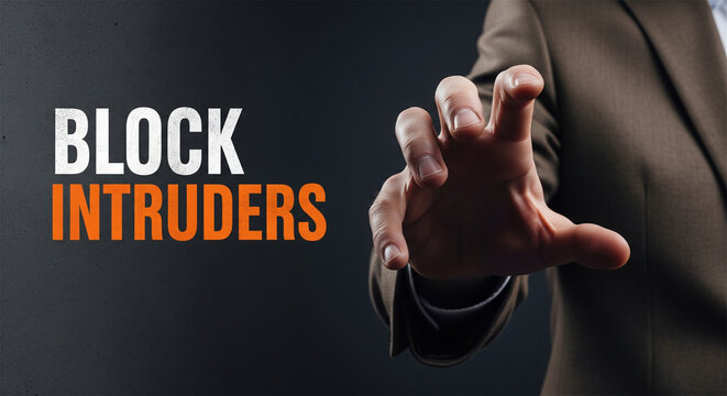 Cybersecurity concept with Block Intruders text, businessman reaching to stop digital threats, network protection and data security