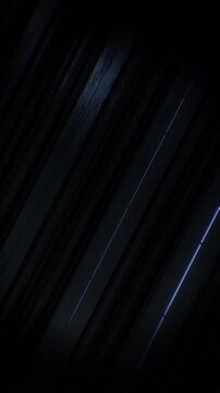 A dark futuristic background loop featuring acoustic tech style panels that move and spin in a random motion.
