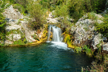 Naklejka premium Waterfall on the Auso river, Cilento, Campania, Italy.