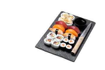 Assorted sushi platter with nigiri and maki rolls isolated on white background. Copy space © chandlervid85