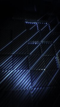 A dark futuristic background loop featuring acoustic tech style panels that move and spin in a random motion.
