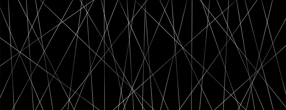 Straight chaotic random lines background. Intersecting white lines on a black background