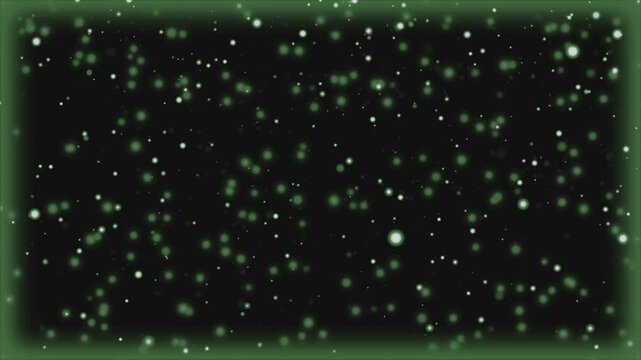 Particles drift softly in a dark space with a green border.