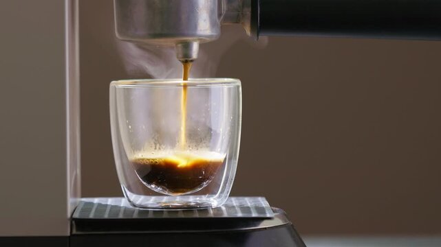 Closeup Video Of A Coffee Machine Brewing A Fresh Espresso Shot 