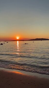 Golden Sunset Reflection on Samil Beach in Vigo, Galicia, Spain