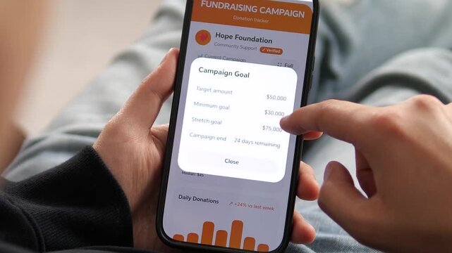 Managing a successful donation campaign from home. Detailed view of a verified foundation dashboard on mobile. Showcases progress bars and financial targets. Top-tier asset for CSR reports and