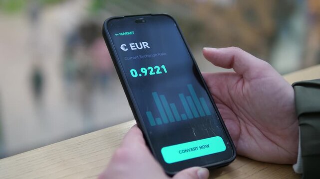 Modern fintech app showing real-time Euro exchange rates on a smartphone. User prepares to convert currency. Ideal for banking, trading, and digital finance projects. High-quality UI design with