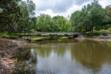Naklejka premium Bridge Over Pond at Bellingrath Gardens and Home