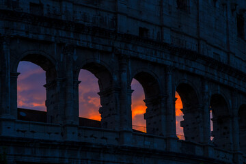 Fototapeta premium Colosseum Arches Silhouette at Dramatic Sunset Rome