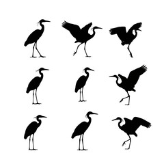 Obraz premium Heron bird silhouette collection, 9 black crane icons in flight and standing poses, elegant egret vector set for nature logos and wildlife design
