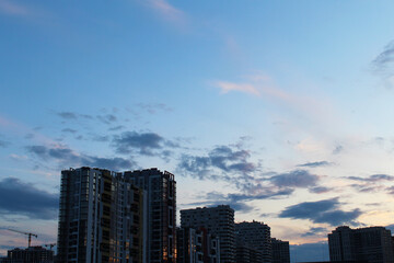 Fototapeta premium clouds over the city, Kyiv city at sunset, Skyline of Kyiv at sunset, evening city Kyiv Ukraine