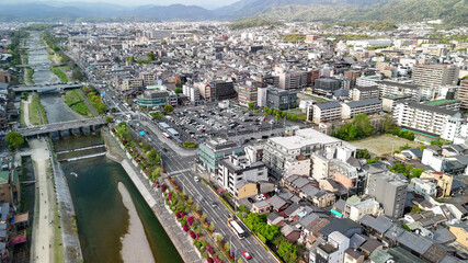 Fototapeta premium Kyoto aerial view with Kamo River and city buildings urban skyline panorama