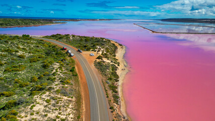 Fototapeta premium Vibrant pink hues of Hutt Lagoon captured from above, a natural wonder in Western Australia
